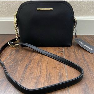 All black Steve Madden purse with gold accents